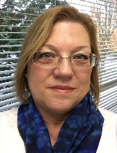 Dr. Lois “Rocki” Adrian-Hollier